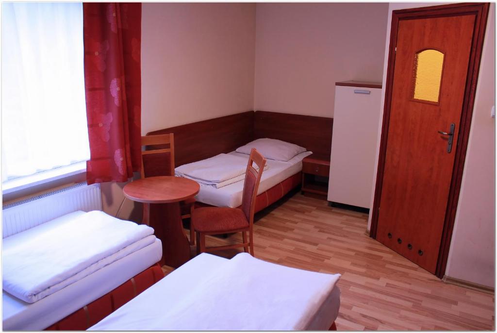 Postel nebo postele na pokoji v ubytování City Hostel