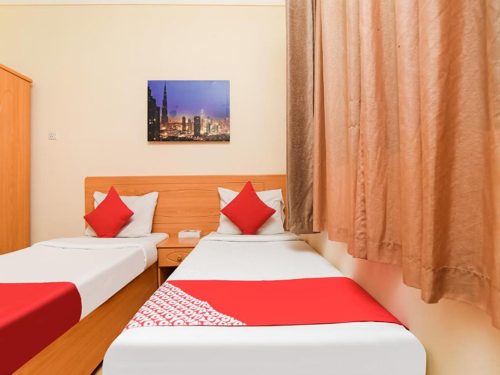 Postel nebo postele na pokoji v ubytování Sama Hotel