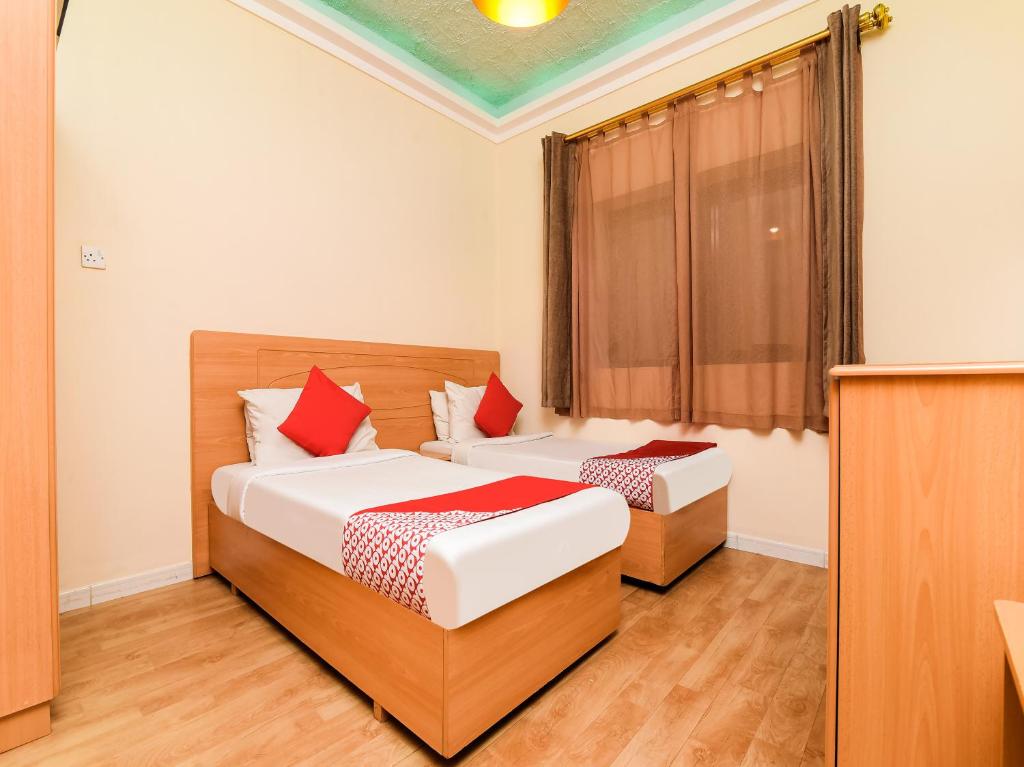 Postel nebo postele na pokoji v ubytování Sama Hotel
