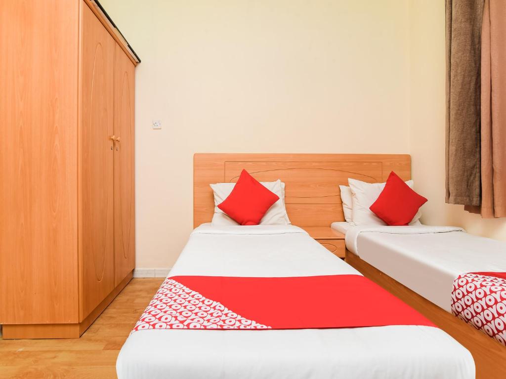 Postel nebo postele na pokoji v ubytování Sama Hotel