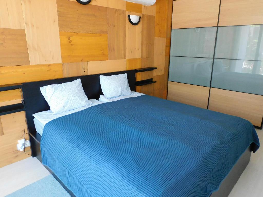 Postel nebo postele na pokoji v ubytování K&K Apartment Siófok
