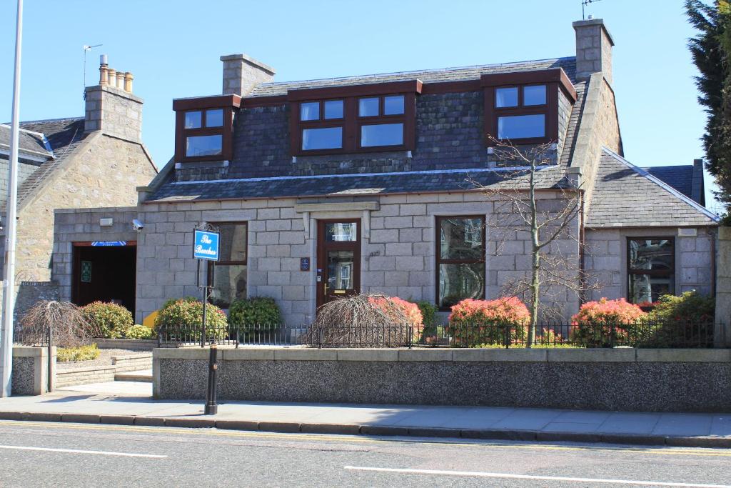 a house on the side of the street at Beeches Aberdeen in Aberdeen