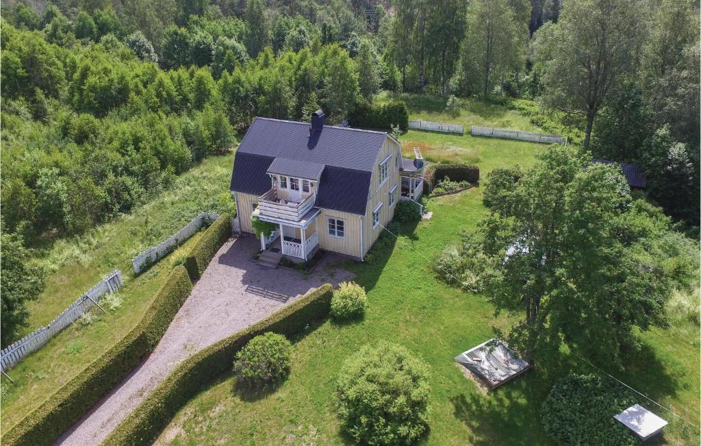 an aerial view of a house in a field at Stunning Home In Lakene With Wifi in Lakene