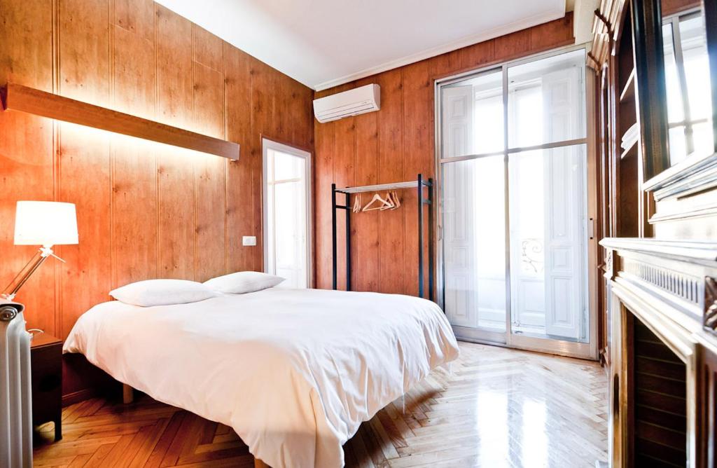 Cama o camas de una habitación en Hostal Asunción