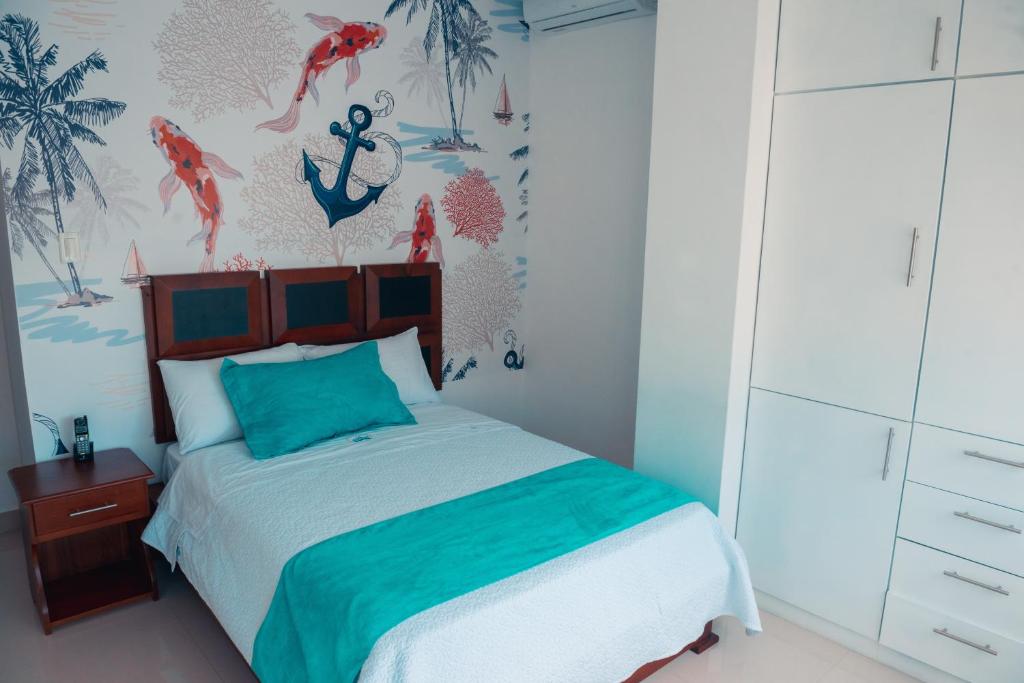 Postel nebo postele na pokoji v ubytování Hotel Casa Arnaldo "Esmeraldas"