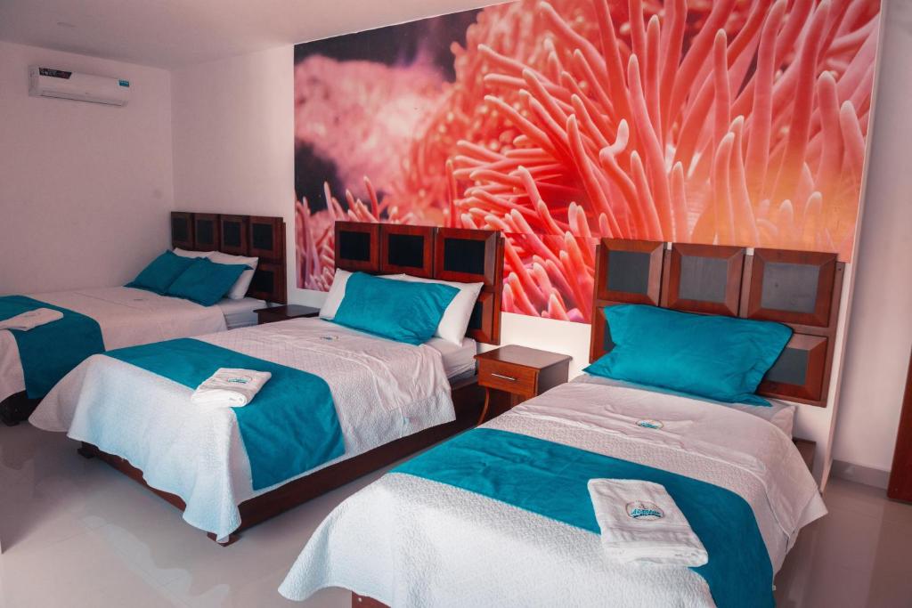 Postel nebo postele na pokoji v ubytování Hotel Casa Arnaldo "Esmeraldas"