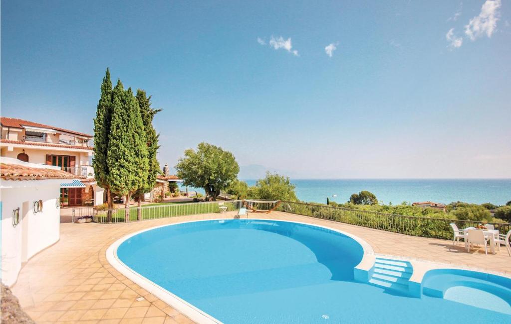 a swimming pool with a view of the ocean at Villa Sole in Bosco