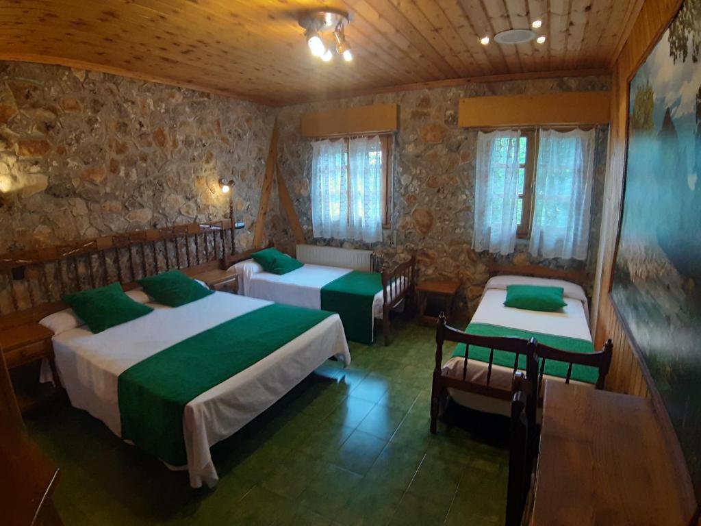 Postel nebo postele na pokoji v ubytování Picon del Conde