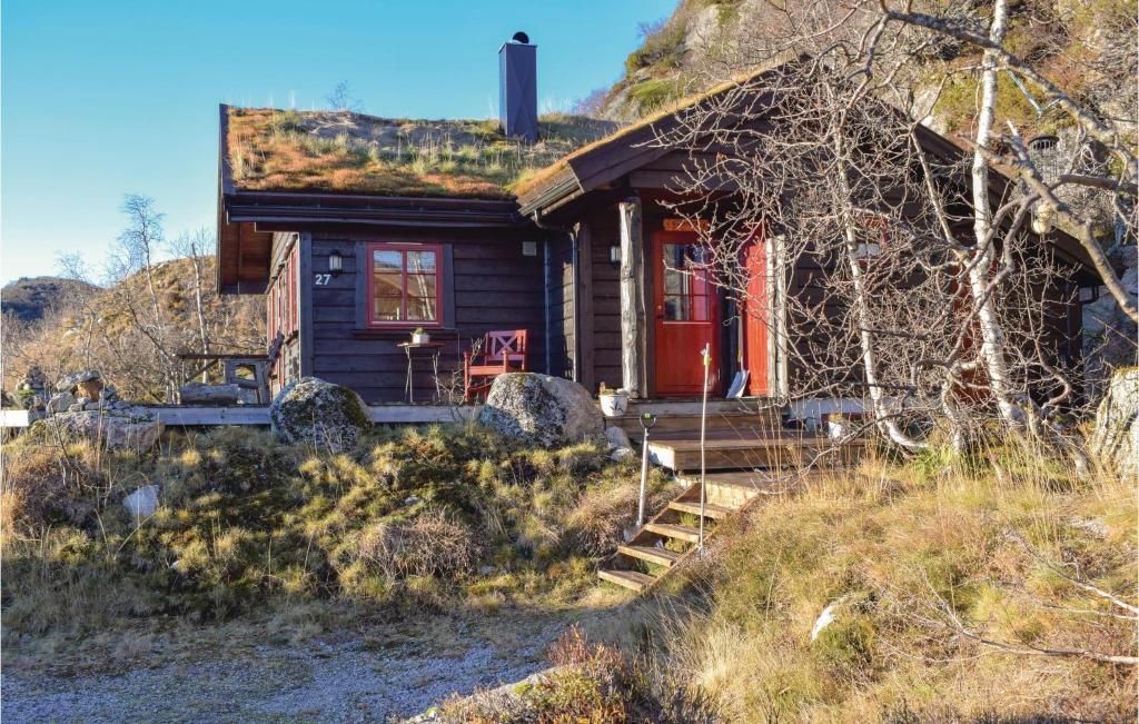 a small house with a grass roof on a hill at 3 Bedroom Beautiful Home In seral in Åseral