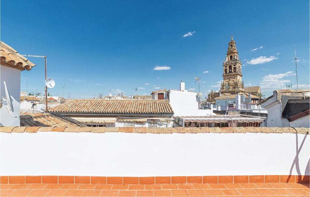 a view of a city with a clock tower at Beautiful Apartment In Crdoba With Kitchenette in Córdoba
