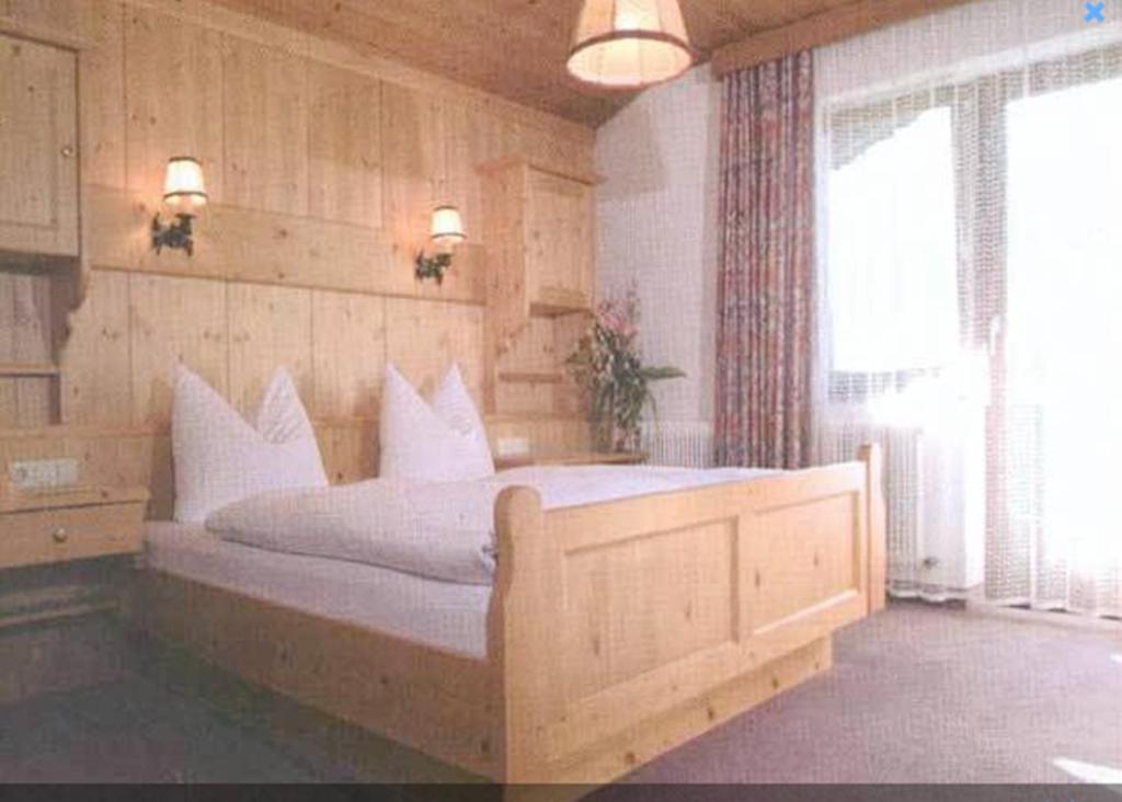 Postel nebo postele na pokoji v ubytování Pension Klausnerhof