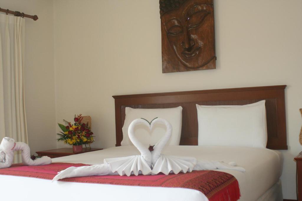 Postel nebo postele na pokoji v ubytování Palmview Resort