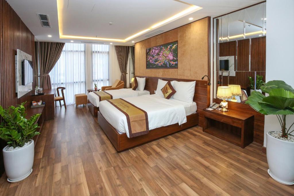 Postel nebo postele na pokoji v ubytování Nagila Boutique Hotel