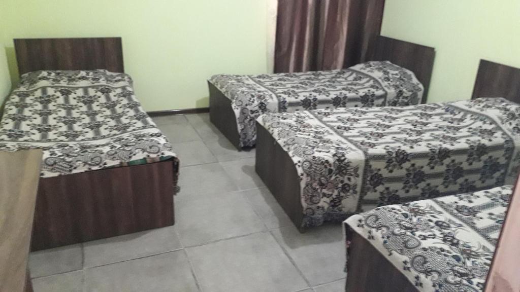 Postel nebo postele na pokoji v ubytování kobuleti bagrationi 40