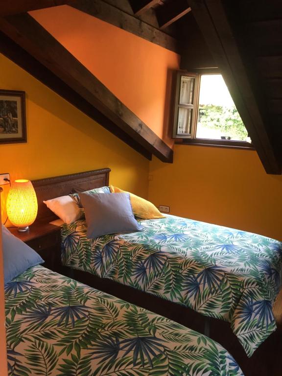 Postel nebo postele na pokoji v ubytování Casa rural Espinareu