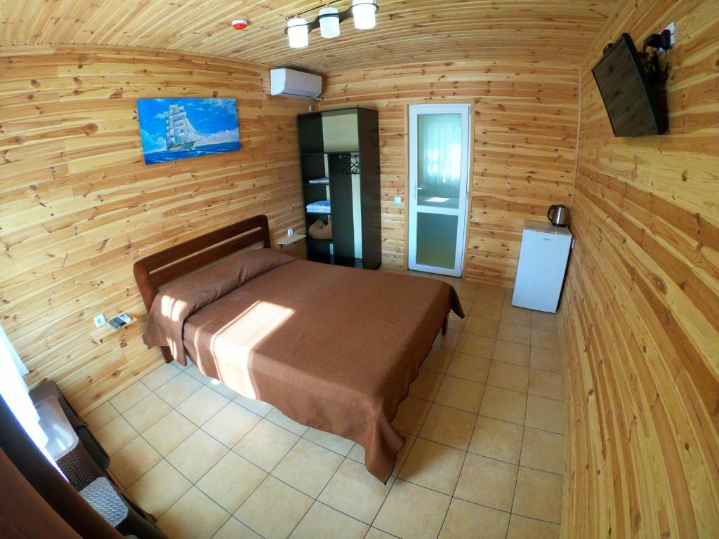 Postel nebo postele na pokoji v ubytování Aquamarine