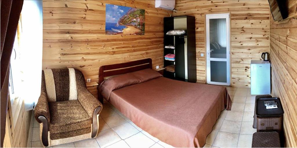 Postel nebo postele na pokoji v ubytování Aquamarine
