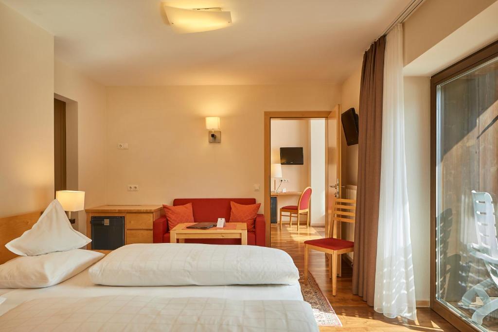Postel nebo postele na pokoji v ubytování Sporthotel Panorama