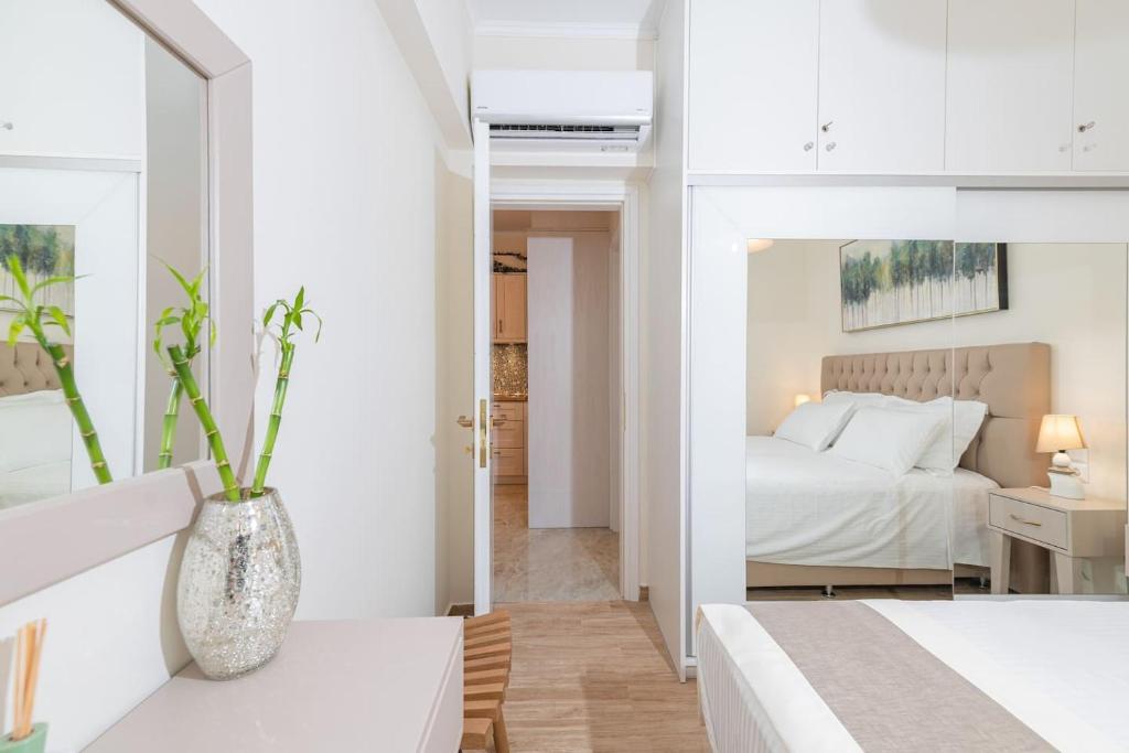 Łóżko lub łóżka w pokoju w obiekcie Casa Aelia, luxury apartment