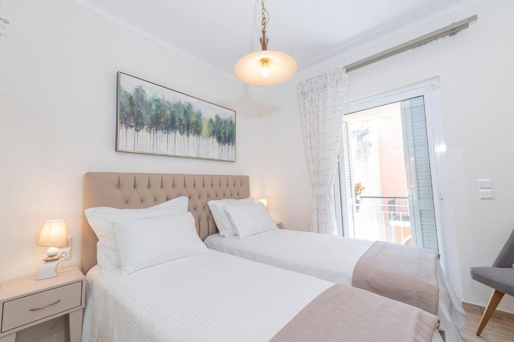 Łóżko lub łóżka w pokoju w obiekcie Casa Aelia, luxury apartment
