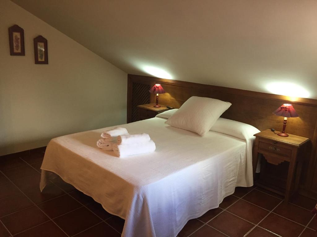 Postel nebo postele na pokoji v ubytování Casa Alameda