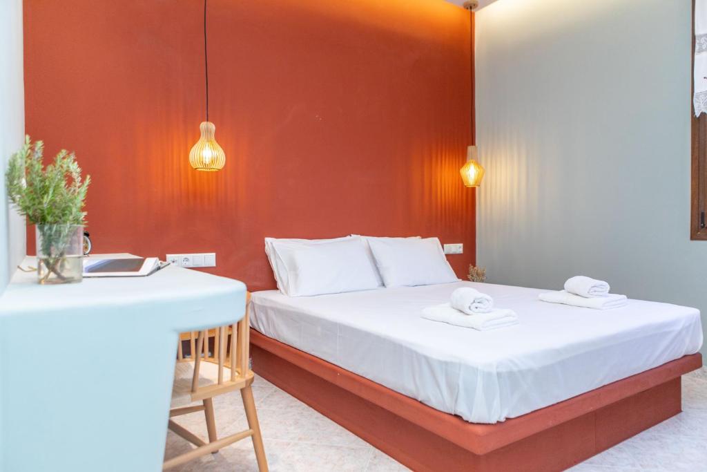 A bed or beds in a room at Naxos View