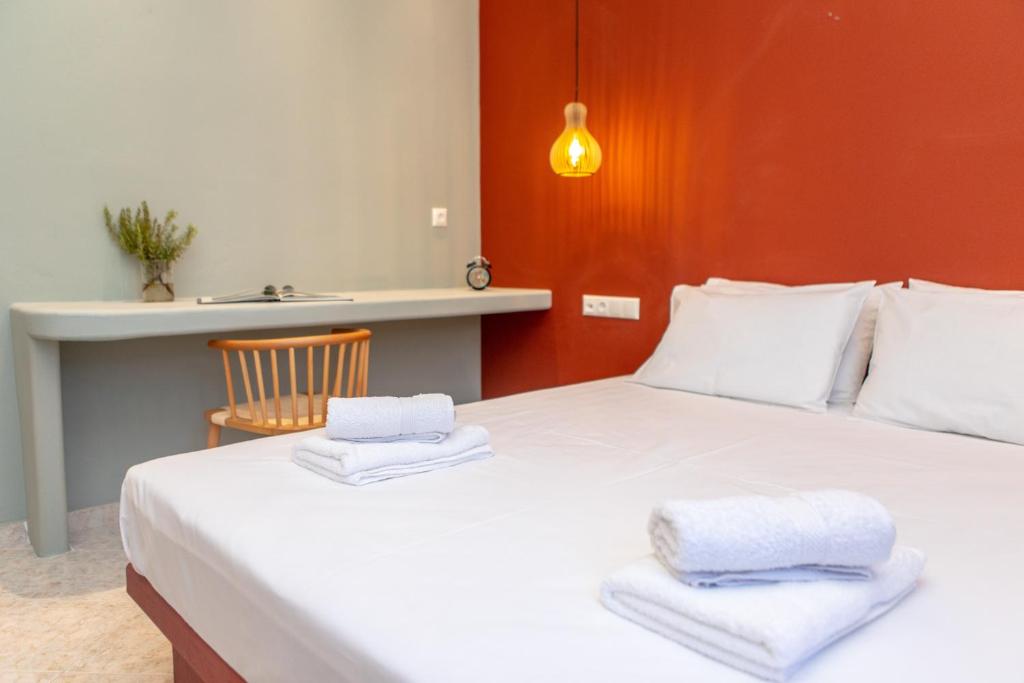 A bed or beds in a room at Naxos View