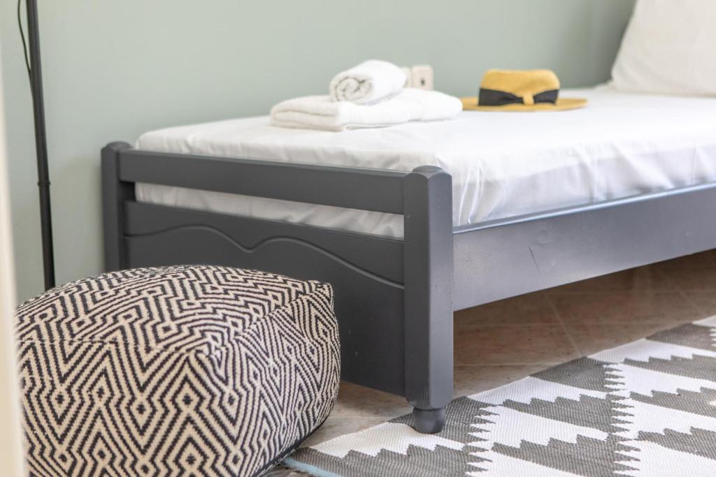 A bed or beds in a room at Naxos View