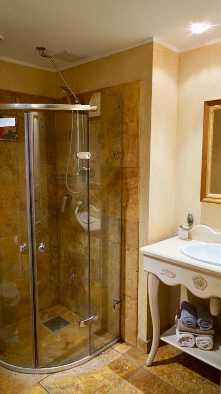 Koupelna v ubytování Grand Rose SPA Hotel