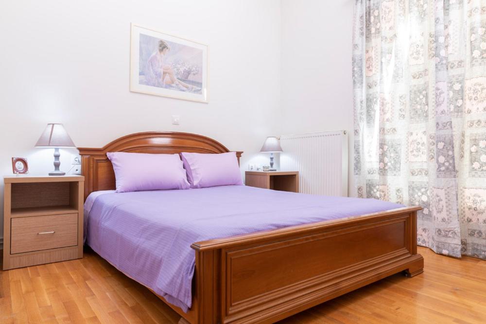 Posteľ alebo postele v izbe v ubytovaní PANOS HOUSE
