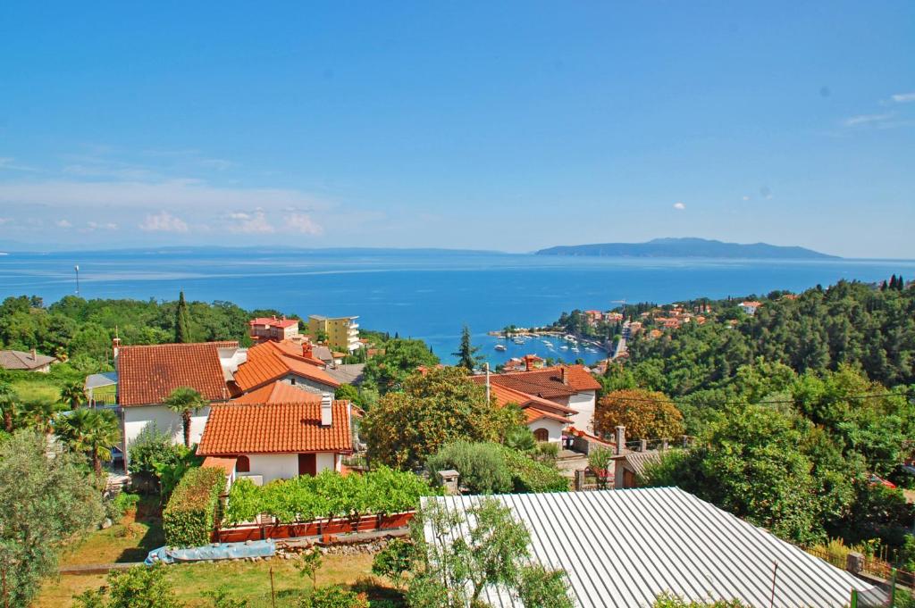 a town with a view of the water at Apartments Kolmanic, sea view, free privat parking in Ičići