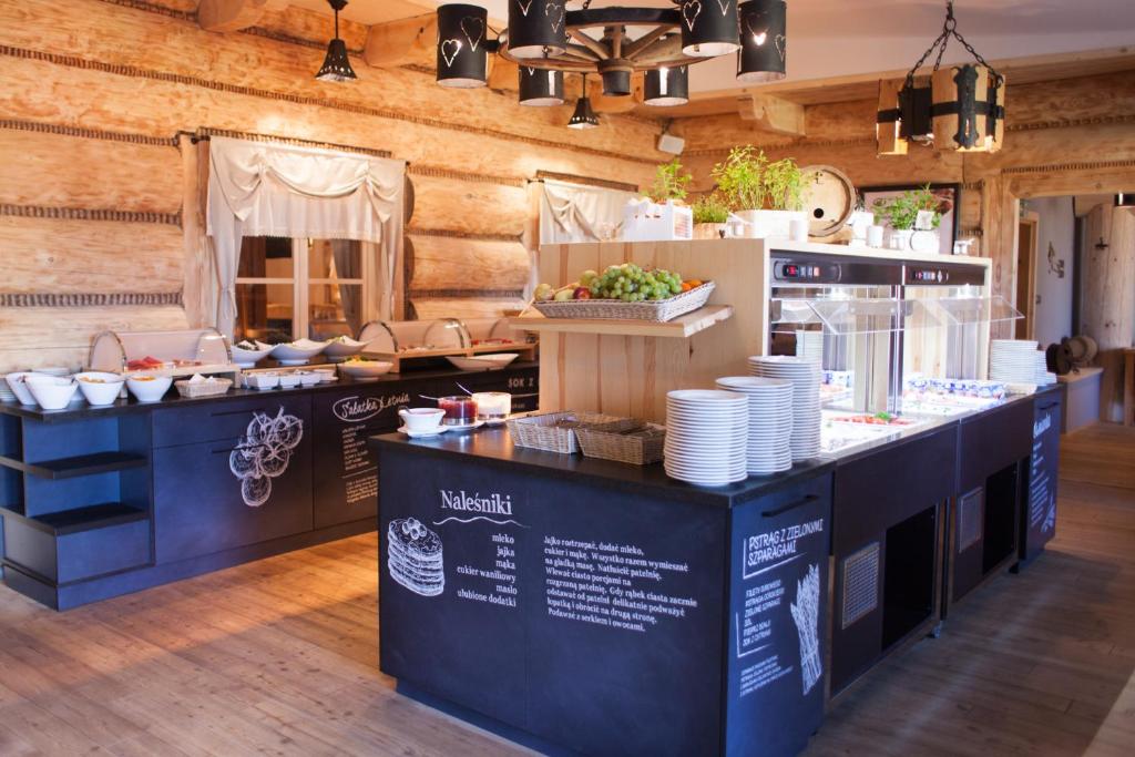 Kuchnia lub aneks kuchenny w obiekcie Kocierz Resort
