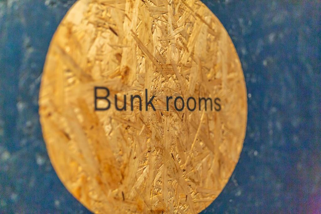 a brown penny with the words bundle rooms on it at Hayama Umino Hotel in Hayama