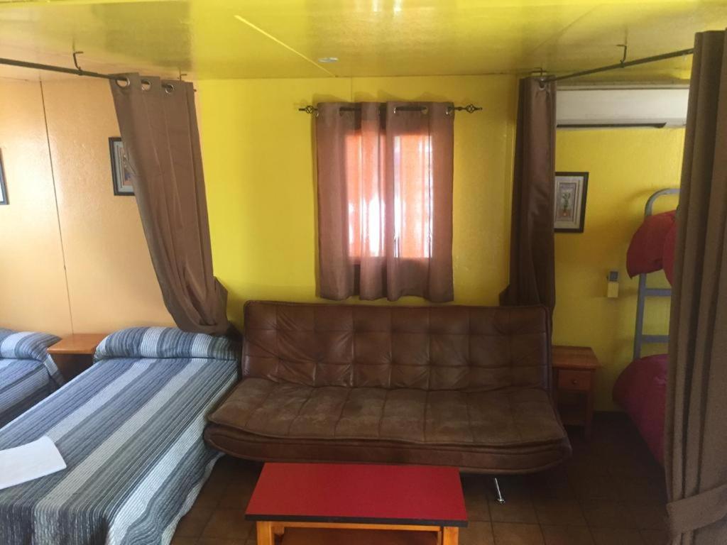 Postel nebo postele na pokoji v ubytování Bungalows Alpha