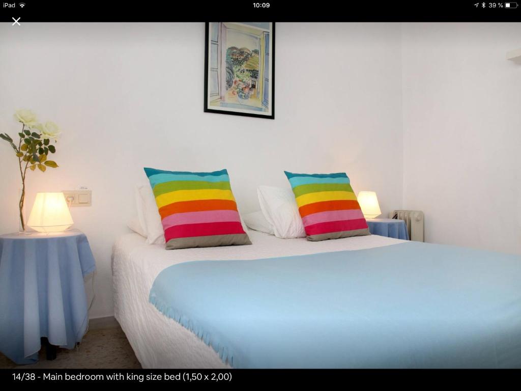 A bed or beds in a room at Golondrina