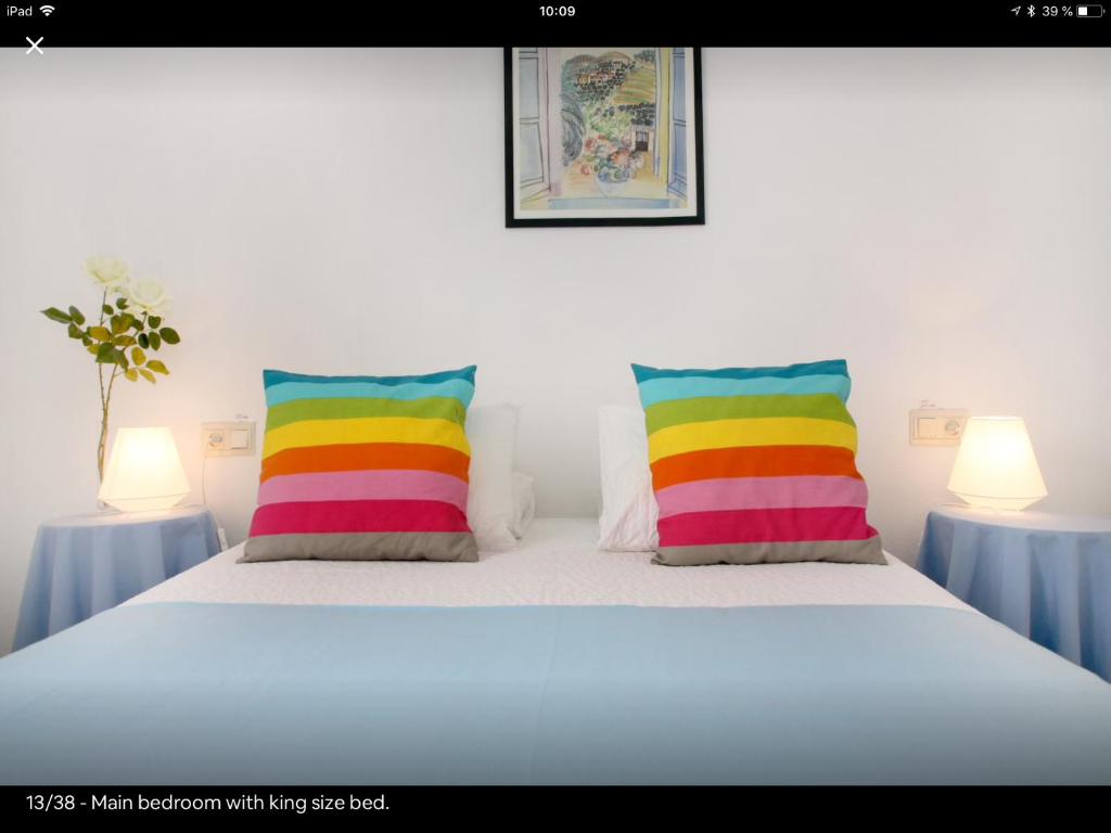 A bed or beds in a room at Golondrina