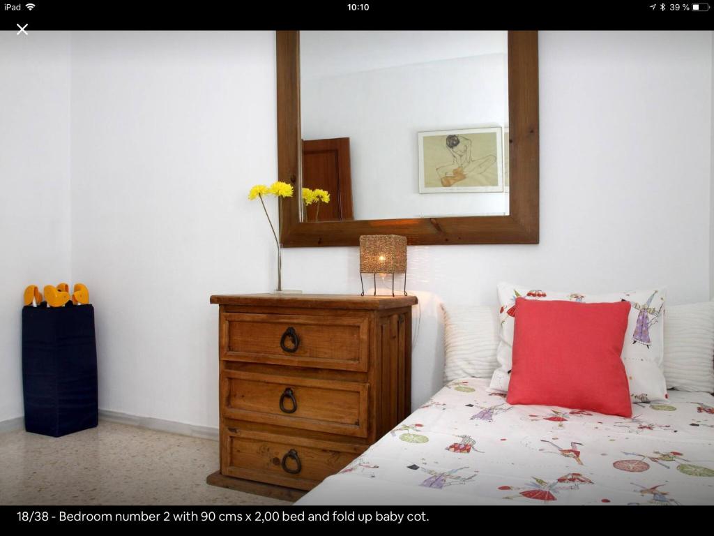 A bed or beds in a room at Golondrina