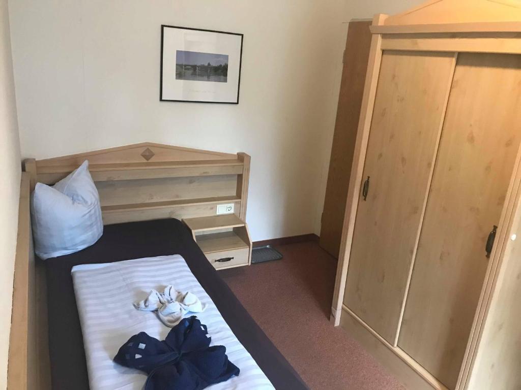 Postel nebo postele na pokoji v ubytování Gasthof zur Hoffnung