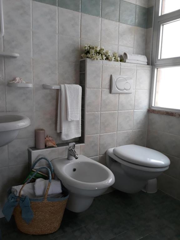 Koupelna v ubytování Hotel Maxim