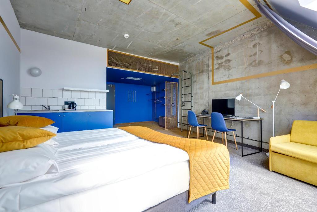 Posteľ alebo postele v izbe v ubytovaní Hotel Arche Geologiczna
