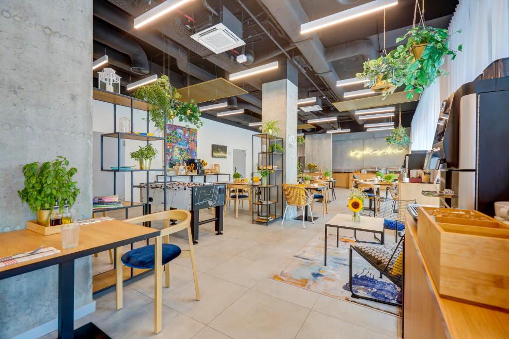 Reštaurácia alebo iné gastronomické zariadenie v ubytovaní Hotel Arche Geologiczna