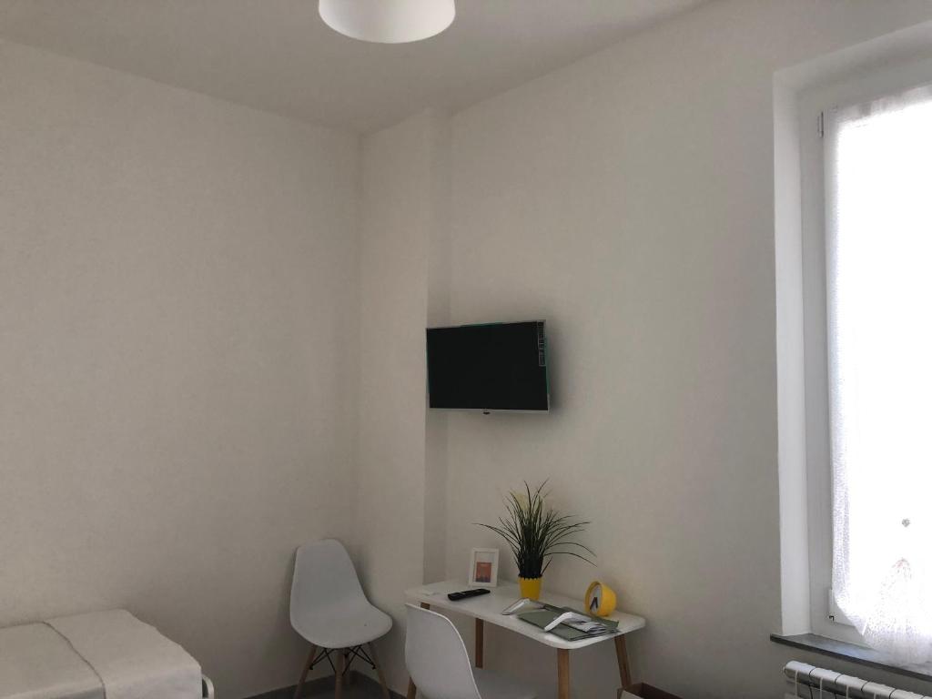 TV a/nebo společenská místnost v ubytování Le Tre Borghesi