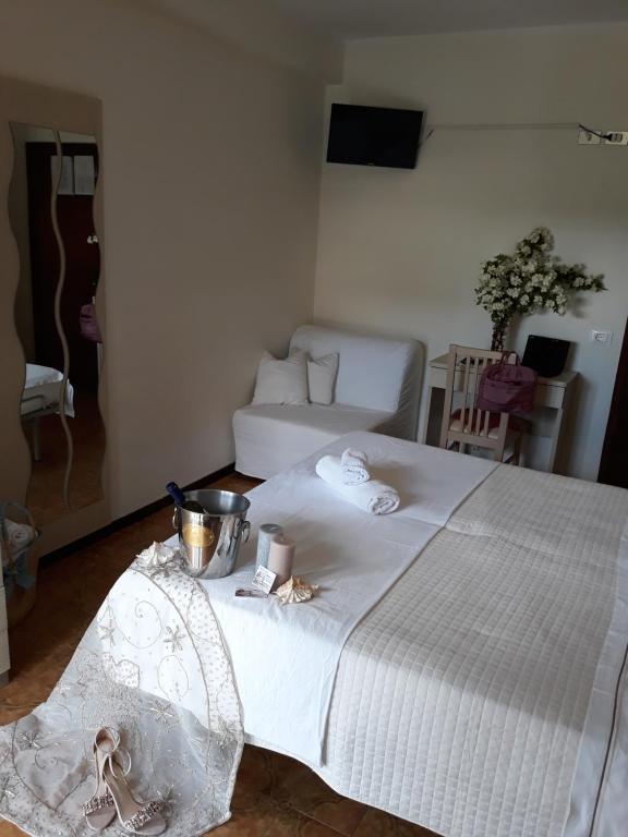 Postel nebo postele na pokoji v ubytování Hotel Maxim
