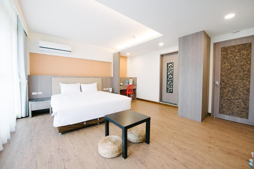 Postel nebo postele na pokoji v ubytování The Stay Inn