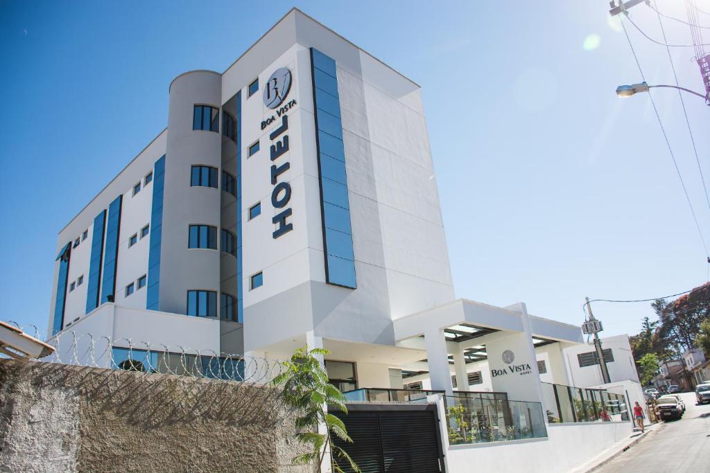 a building with the name of the hotel at Boa Vista Hotel in Oliveira