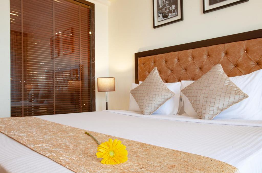 Postel nebo postele na pokoji v ubytování Royale Exotica, Goa