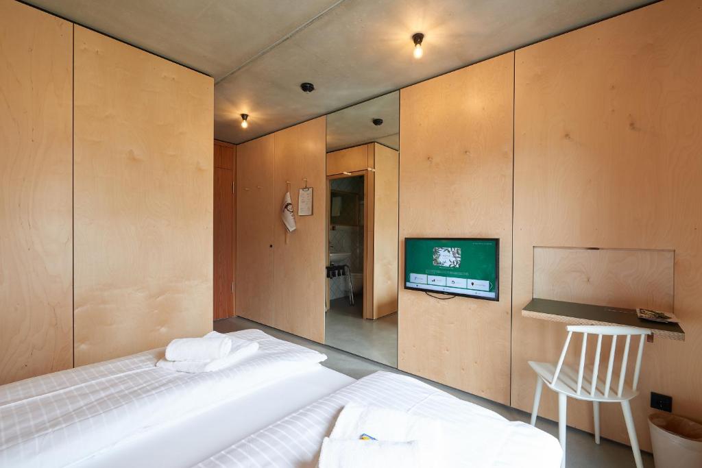 Postel nebo postele na pokoji v ubytování Kitz Boutique Hotel & Restaurant