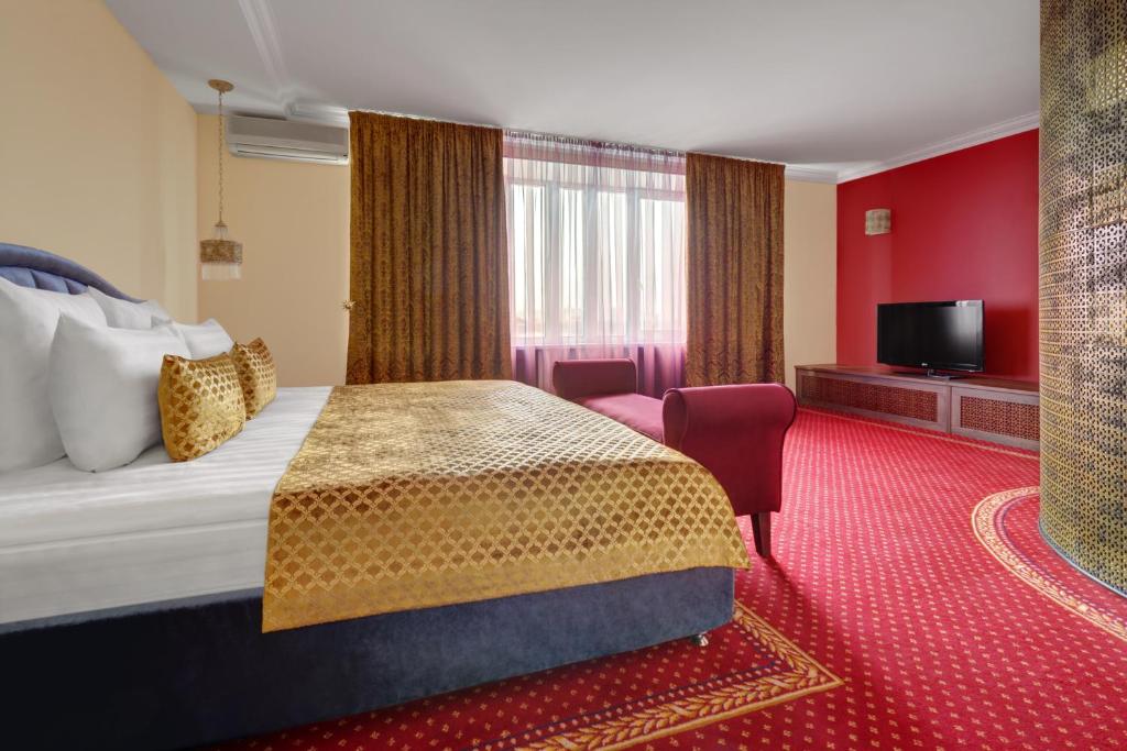 Cama o camas de una habitación en Zvezdnaya Hotel