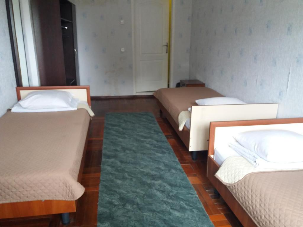 Postel nebo postele na pokoji v ubytování Hotel Aleksandria