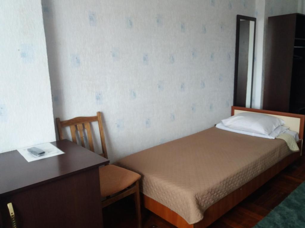 Postel nebo postele na pokoji v ubytování Hotel Aleksandria